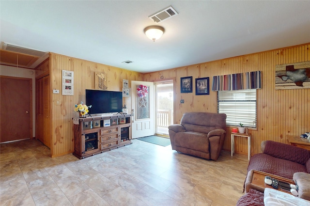 1321 Pickney Ave, Port Bolivar, TX 77650 - living area featuring wooden walls