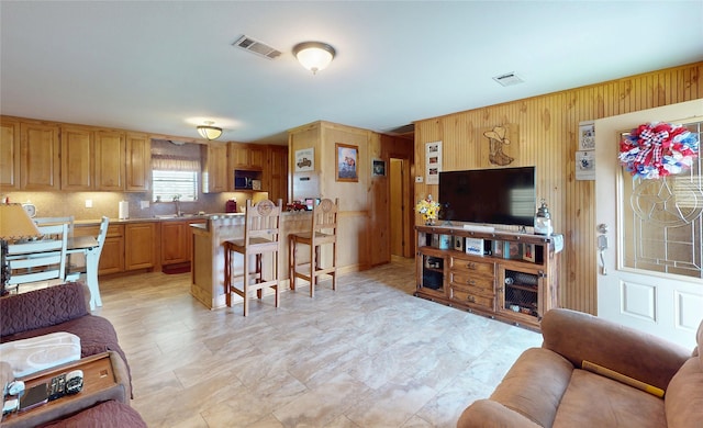 1321 Pickney Ave, Port Bolivar, TX 77650 - living room with wooden walls