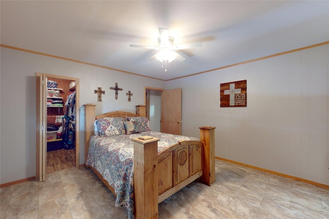 1321 Pickney Ave, Port Bolivar, TX 77650 - bedroom with ornamental molding, a spacious closet, ceiling fan, a closet, and baseboards