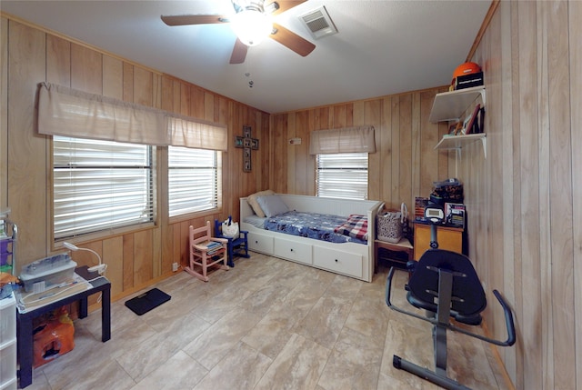 1321 Pickney Ave, Port Bolivar, TX 77650 - bedroom with wooden walls and a ceiling fan