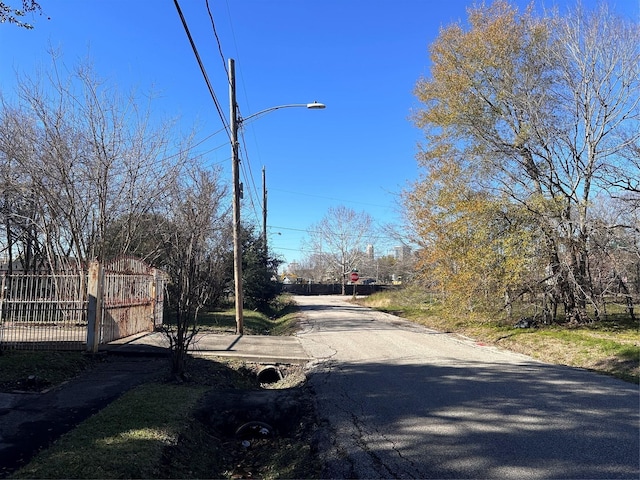 3016 Gray St, Houston, TX 77004 - view of asphalt street with traffic signs and street lights