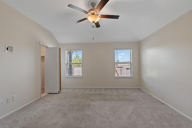 323 Jewett Meadow Dr, Magnolia, TX 77354 - empty room with lofted ceiling, a ceiling fan, light colored carpet, and baseboards
