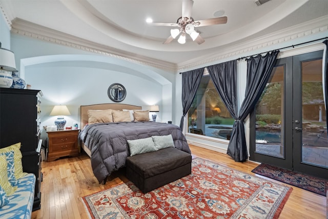 11 Hope Valley Pl, The Woodlands, TX 77382 - bedroom featuring access to exterior, hardwood / wood-style floors, crown molding, french doors, and ceiling fan