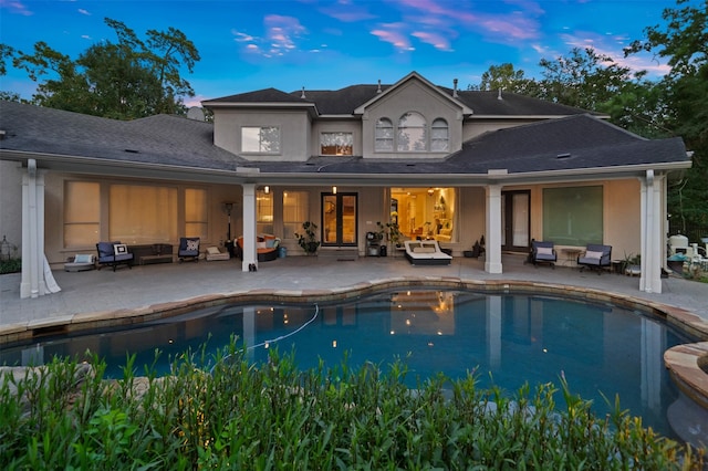 11 Hope Valley Pl, The Woodlands, TX 77382 - rear view of house with outdoor lounge area, a patio, and stucco siding