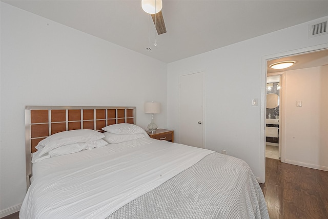 3131 Cummins St Unit 11, Houston, TX 77027 - bedroom featuring wood finished floors, baseboards, and a ceiling fan