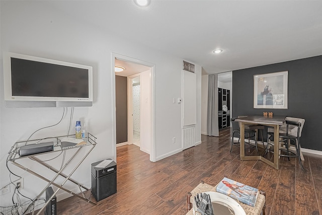3131 Cummins St Unit 11, Houston, TX 77027 - living area featuring wood finished floors, baseboards, and recessed lighting