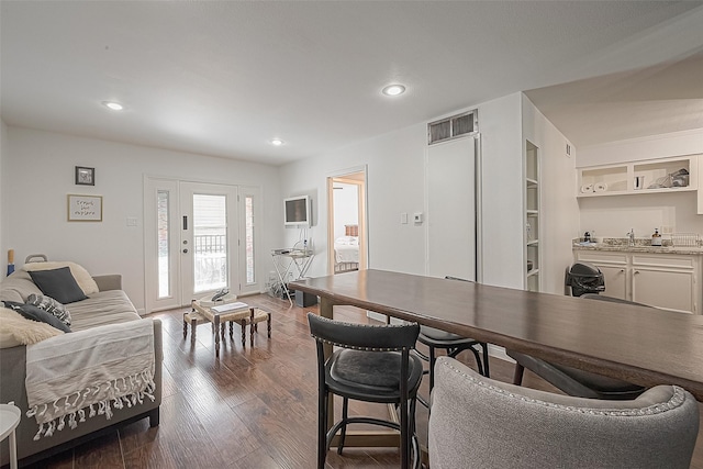3131 Cummins St Unit 11, Houston, TX 77027 - dining space featuring dark wood finished floors and recessed lighting