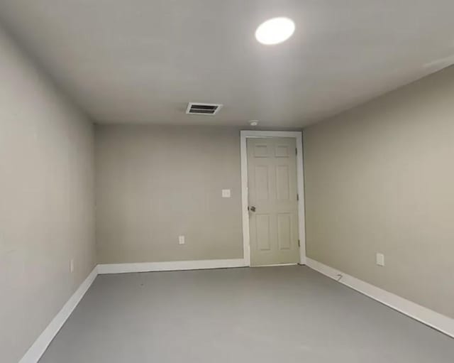 7318 Thurow St, Houston, TX 77087 - spare room featuring concrete floors and baseboards