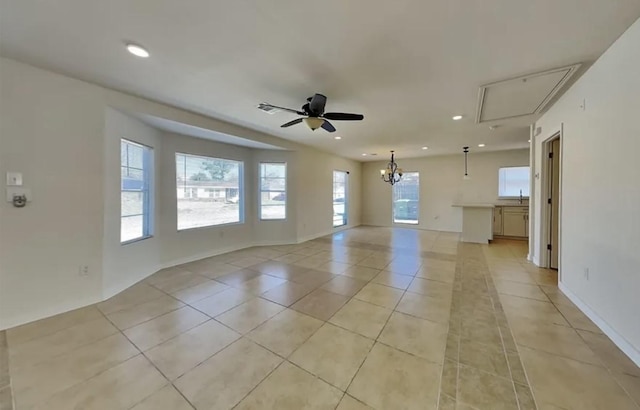 7318 Thurow St, Houston, TX 77087 - empty room featuring attic access, light tile patterned floors, ceiling fan, a sink, and recessed lighting