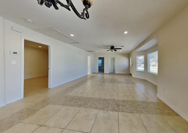 7318 Thurow St, Houston, TX 77087 - unfurnished room with ceiling fan, light tile patterned flooring, recessed lighting, attic access, and baseboards