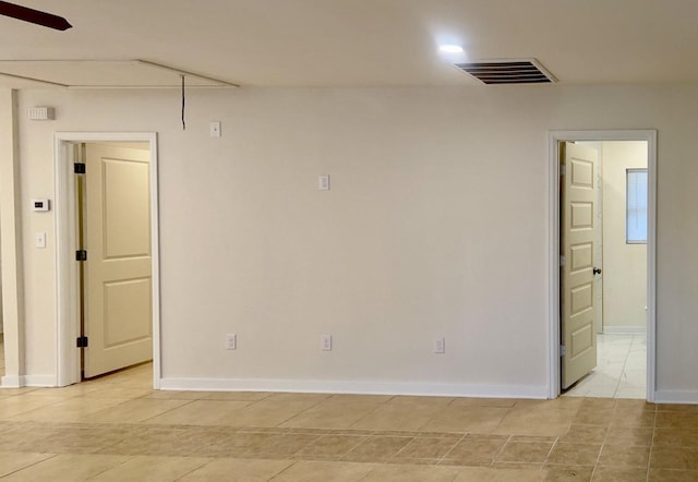 7318 Thurow St, Houston, TX 77087 - spare room with light tile patterned floors and baseboards