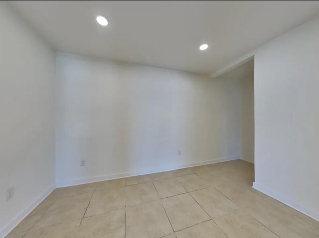 7318 Thurow St, Houston, TX 77087 - unfurnished room featuring recessed lighting, light tile patterned flooring, and baseboards