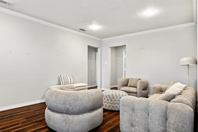 908 Kelley St, Houston, TX 77009 - living area featuring ornamental molding, baseboards, and dark wood finished floors