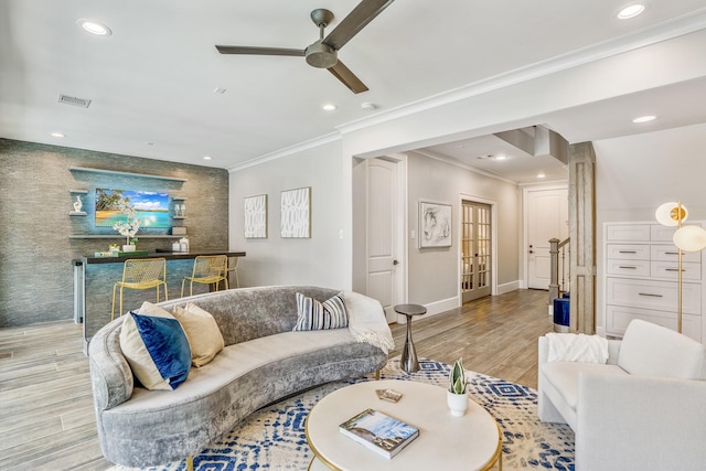 5420 Mcculloch Cir, Houston, TX 77056 - living area with a ceiling fan, wood finished floors, baseboards, recessed lighting, and crown molding
