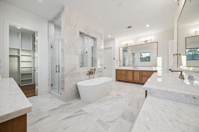 1314 Richelieu Ln, Houston, TX 77018 - bathroom with a shower stall, two vanities, a freestanding bath, and recessed lighting