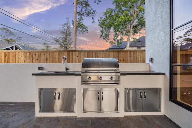 1314 Richelieu Ln, Houston, TX 77018 - patio terrace at dusk with a sink
