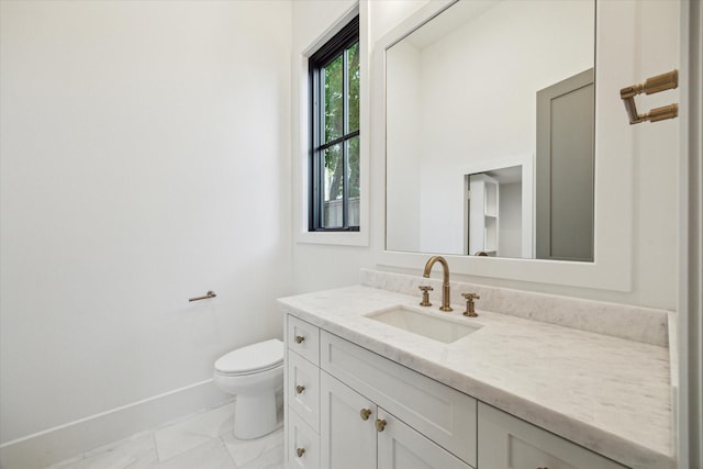 1314 Richelieu Ln, Houston, TX 77018 - half bath with vanity, toilet, baseboards, and marble look tiles