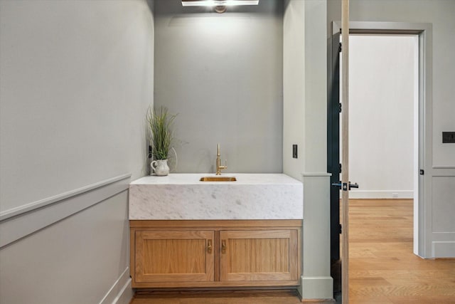 1314 Richelieu Ln, Houston, TX 77018 - bathroom with wood finished floors, vanity, and baseboards