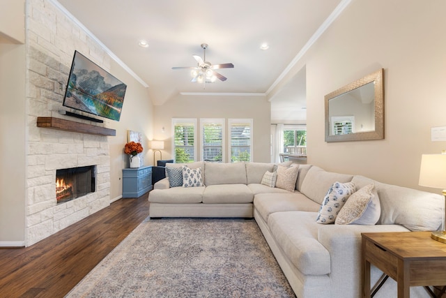 813 Woodland Ct, Conroe, TX 77302 - living area featuring crown molding, ceiling fan, dark wood-style flooring, a fireplace, and baseboards