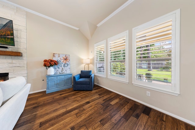 813 Woodland Ct, Conroe, TX 77302 - sitting room featuring crown molding, lofted ceiling, wood finished floors, a fireplace, and baseboards