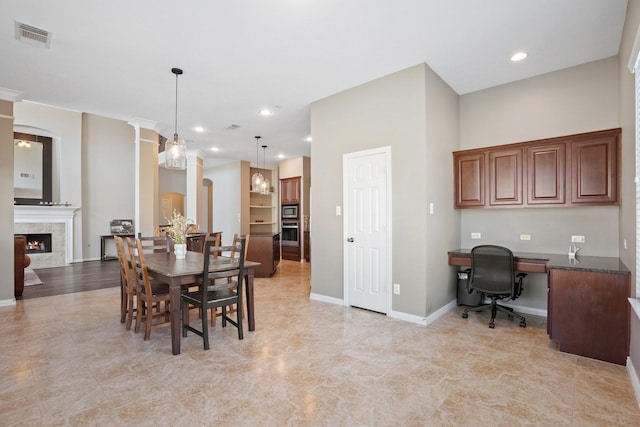 18430 S Settlers Shore Dr, Cypress, TX 77433 - dining area featuring a high end fireplace, recessed lighting, and baseboards
