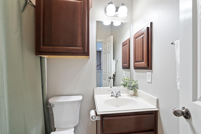 18430 S Settlers Shore Dr, Cypress, TX 77433 - bathroom with vanity, toilet, and curtained shower