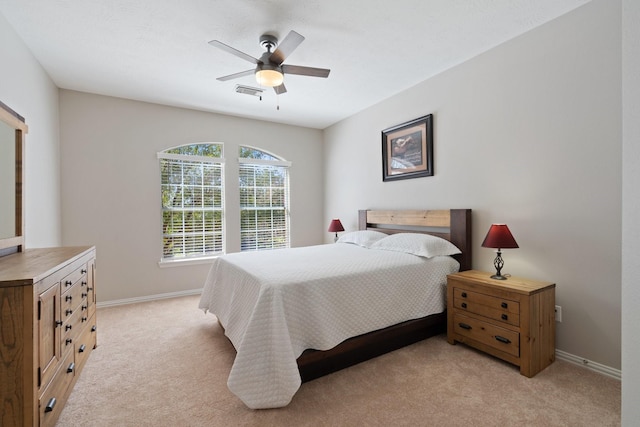 18430 S Settlers Shore Dr, Cypress, TX 77433 - bedroom featuring light carpet, baseboards, and a ceiling fan