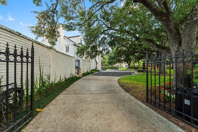 1561 Kirby Dr, Houston, TX 77019 - view of concrete surface featuring a gated entry