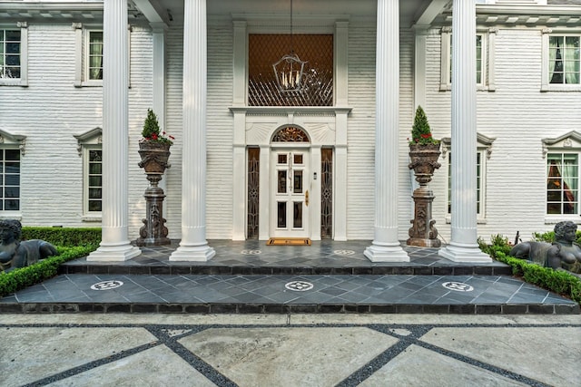 1561 Kirby Dr, Houston, TX 77019 - view of exterior entry featuring a porch