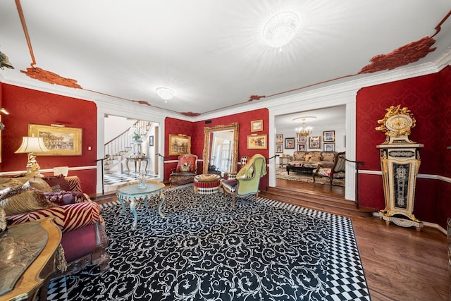 1561 Kirby Dr, Houston, TX 77019 - living room with wood finished floors, stairs, a chandelier, and ornamental molding
