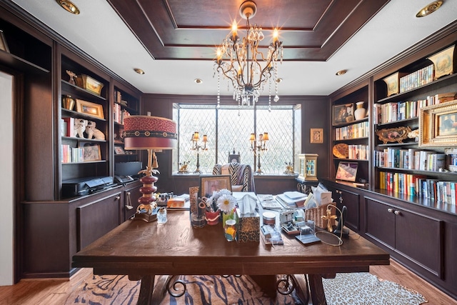 1561 Kirby Dr, Houston, TX 77019 - office featuring a chandelier, light wood-style flooring, and a tray ceiling