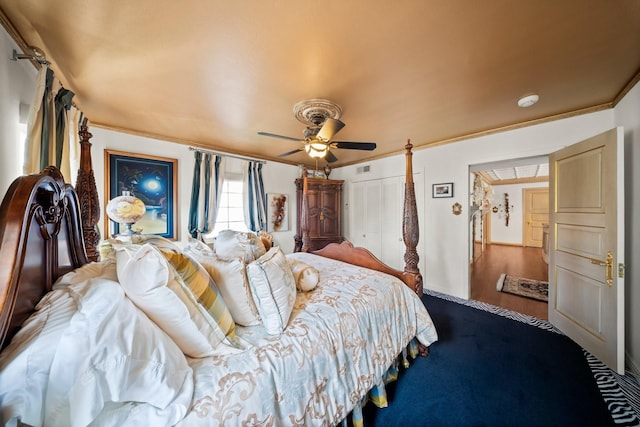 1561 Kirby Dr, Houston, TX 77019 - bedroom with crown molding, a ceiling fan, and a closet