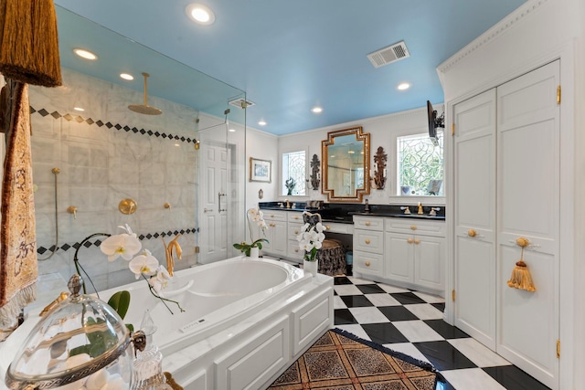 1561 Kirby Dr, Houston, TX 77019 - full bathroom with tiled shower, a bath, vanity, and recessed lighting