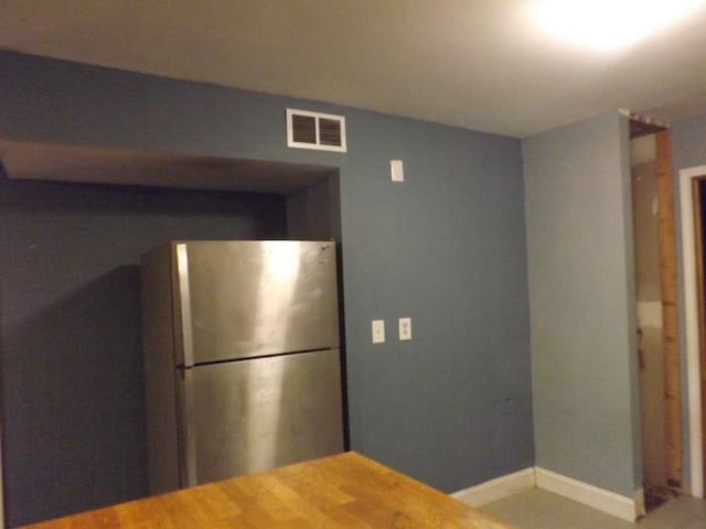 8282 Park Place Blvd Unit G2, Houston, TX 77017 - kitchen with freestanding refrigerator and baseboards