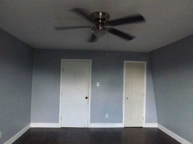 8282 Park Place Blvd Unit G2, Houston, TX 77017 - unfurnished bedroom featuring baseboards, wood finished floors, and a ceiling fan