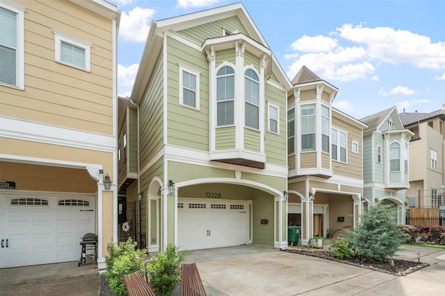 1332 W 25th St Unit A, Houston, TX 77008 - view of front of house featuring an attached garage and driveway