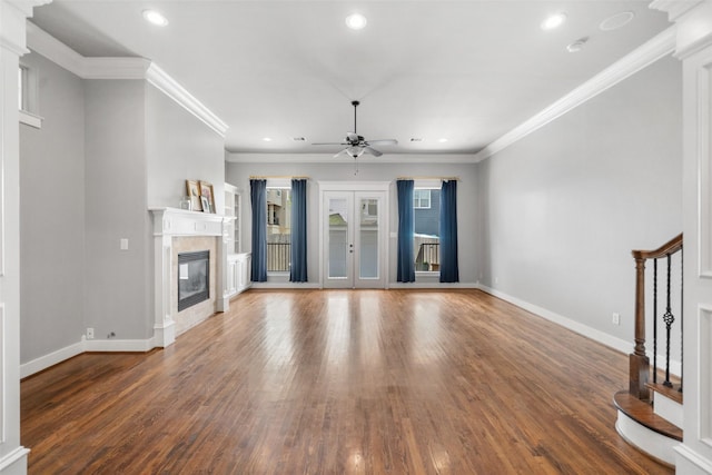 1332 W 25th St Unit A, Houston, TX 77008 - unfurnished living room featuring a ceiling fan, recessed lighting, wood finished floors, a glass covered fireplace, and baseboards