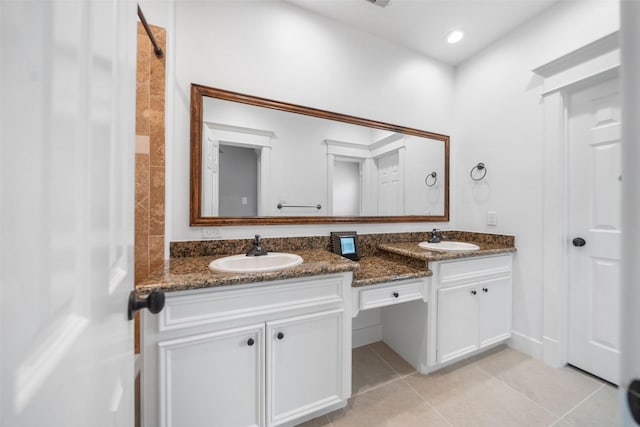 1332 W 25th St Unit A, Houston, TX 77008 - full bathroom with double vanity, tile patterned floors, and a shower