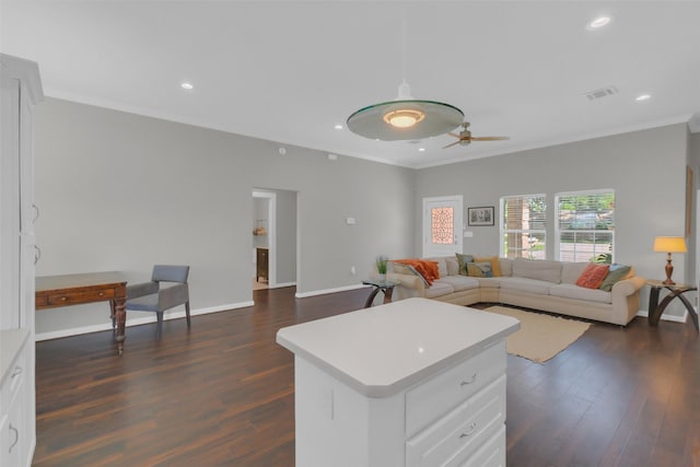 9206 Gene St, Needville, TX 77461 - living area with dark wood-style floors, crown molding, a ceiling fan, and recessed lighting