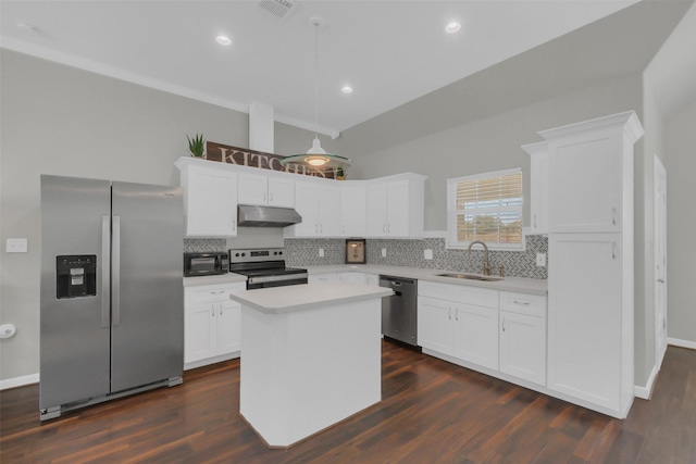 9206 Gene St, Needville, TX 77461 - kitchen with appliances with stainless steel finishes, under cabinet range hood, tasteful backsplash, light countertops, and high vaulted ceiling
