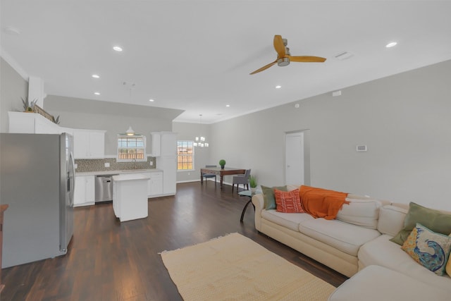 9206 Gene St, Needville, TX 77461 - living room with a chandelier, ceiling fan, dark wood-style flooring, and recessed lighting