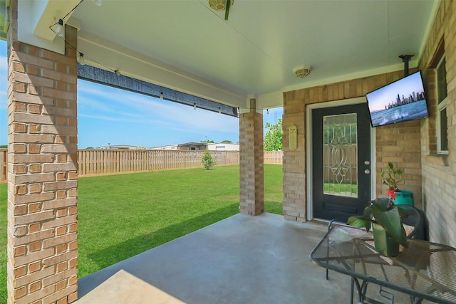 9206 Gene St, Needville, TX 77461 - fenced backyard featuring a patio