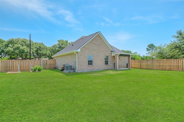 9206 Gene St, Needville, TX 77461 - rear view of house with a fenced backyard