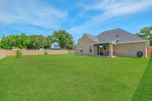 9206 Gene St, Needville, TX 77461 - fenced backyard with a patio