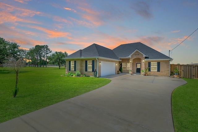 9206 Gene St, Needville, TX 77461 - view of front facade featuring an attached garage, concrete driveway, and a shingled roof