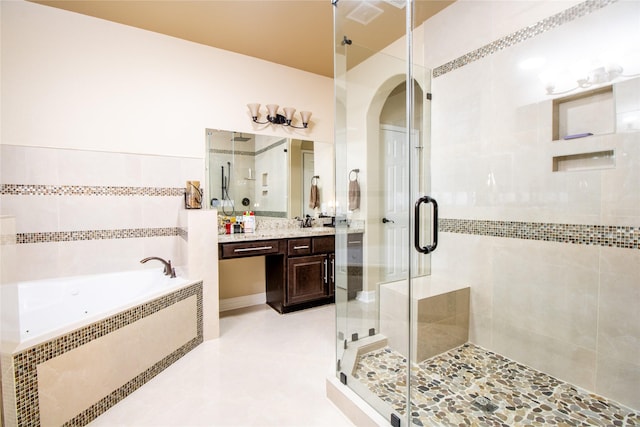1115 Haye Rd, Friendswood, TX 77546 - full bath featuring a stall shower, vanity, a garden tub, and radiator