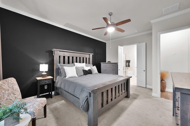 17413 Turtleweed Ln, Conroe, TX 77385 - bedroom with light carpet, ornamental molding, baseboards, ceiling fan, and ensuite bath