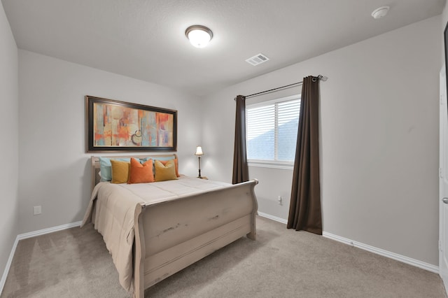 17413 Turtleweed Ln, Conroe, TX 77385 - bedroom featuring light carpet and baseboards