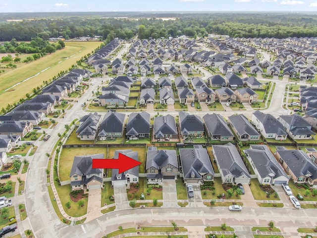 17413 Turtleweed Ln, Conroe, TX 77385 - aerial view of property's location with nearby suburban area