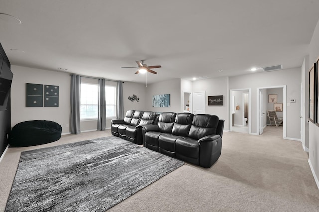 17413 Turtleweed Ln, Conroe, TX 77385 - living area featuring light colored carpet, a ceiling fan, baseboards, and recessed lighting